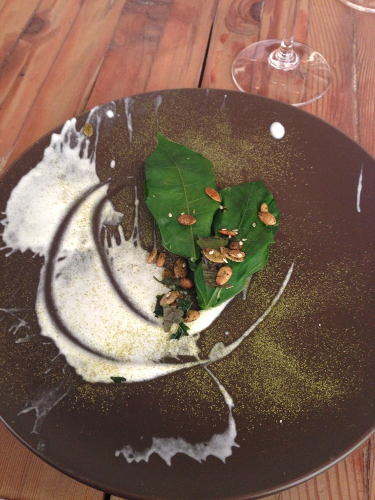Chaya leaf stuffed with potato and Thai aromatics, with yogurt, dried kale and seeds