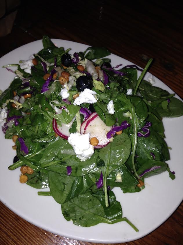 butter chicken salad with local greens tossed with crisp lentils, chevre, blueberries & radishes piled on top of our butter chicken