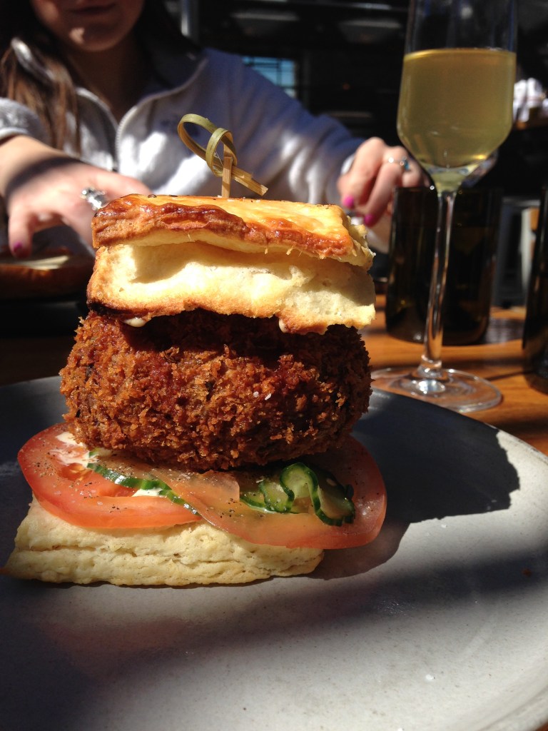 Scotch egg breakfast biscuit with homemade mustard sauce!