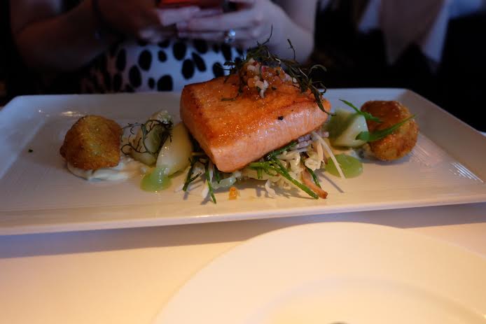 Wild King Salmon pan roasted with garlic & thyme Fried Green Tomatoes with Tartar Sauce & Dill Double Smoked Bacon, Sea Bean, Savoy Cabbage & Hearts of Palm Slaw Green Tomato Coulis & Persian Cucumbers