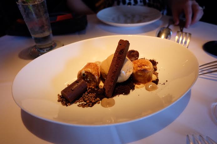 Bittersweet chocolate and caramel “S’MORE” - Cocoa Nib Ganache, Chocolate Shortbread, Salted Caramel Marshmallow, Caramel Ice Cream with Graham Cracker 