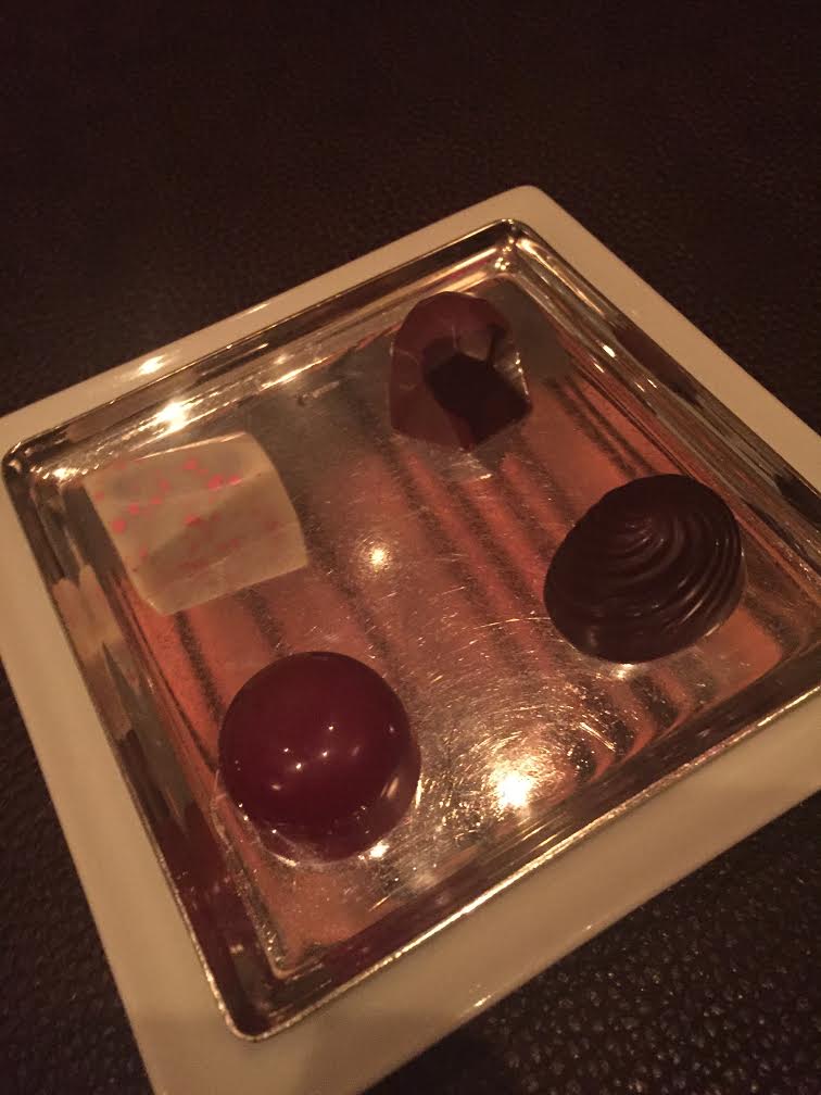 Rose & Raspberry Truffle, Burbon Pecan Truffle, Caramelized Pistachio Truffle, Peanut Butter & Raspberry Truffle